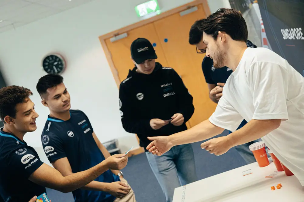 Louis working with a team